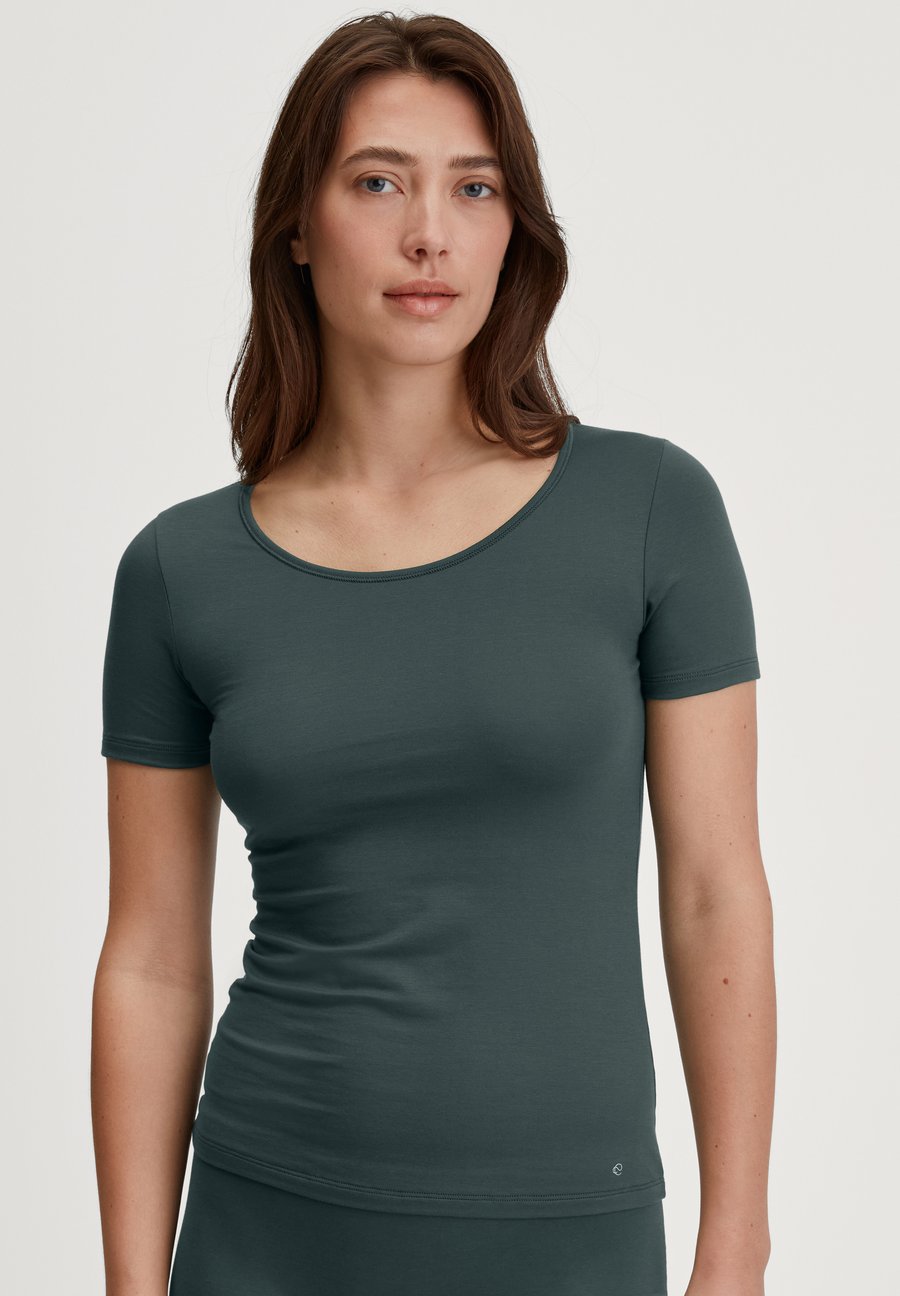 Пижамный топ Calida NATURAL COMFORT, Deep Emerald Green/Metallic Green
Пижамный топ Calida NATURAL COMFORT, Deep Emerald Green/Metallic Green