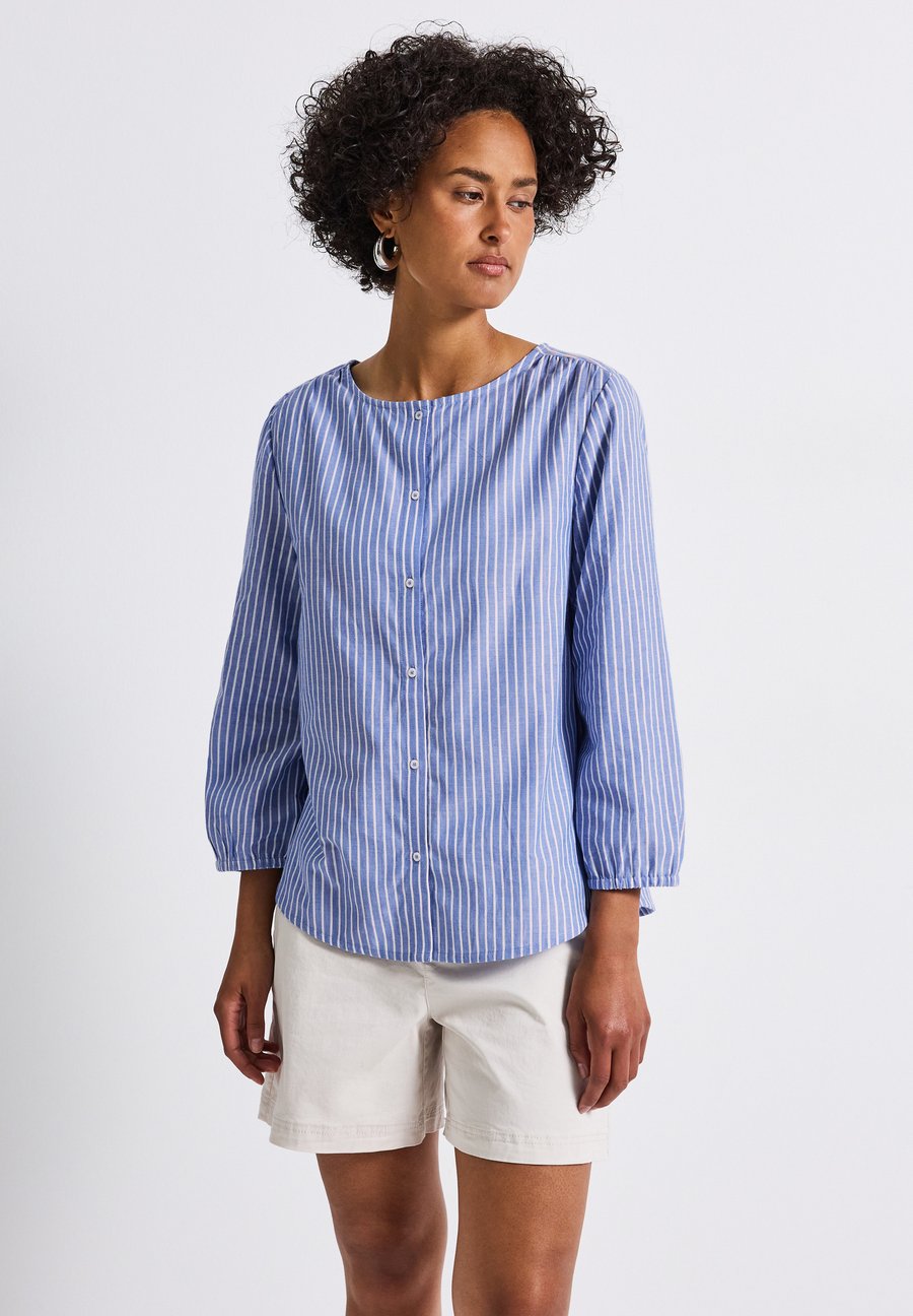 Блуза Street One GESTREIFTE MIT GLITZER, Blau/Blue-Black Denim
Блуза Street One GESTREIFTE MIT GLITZER, Blau/Blue-Black Denim