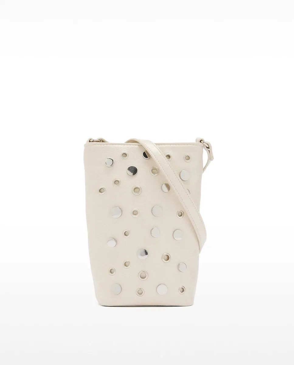 Сумка для телефона с шипами и молнией, трансформирующаяся в поясную Parfois, пастельно-розовый
Сумка для телефона с шипами и молнией, трансформирующаяся в поясную Parfois, пастельно-розовый