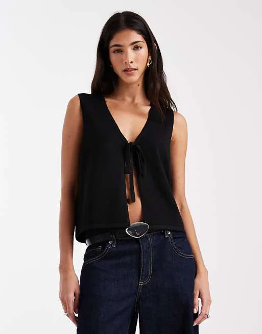 Черный вязаный топ без рукавов с завязками спереди Pieces
Черный вязаный топ без рукавов с завязками спереди Pieces