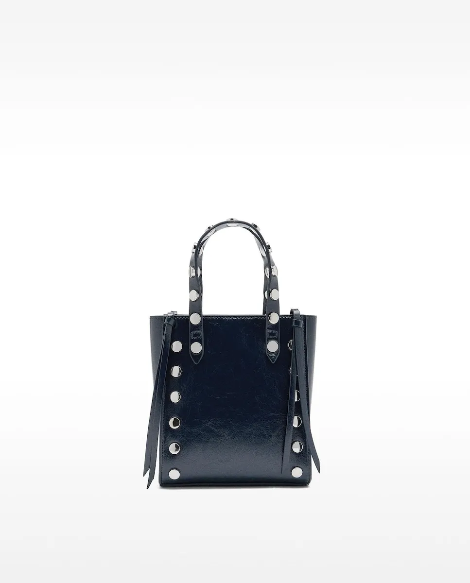 Сумка-тоут на руку, трансформирующаяся в сумку через плечо, с декоративными заклепками и магнитной застежкой, однотонная Parfois, темно-синий
Сумка-тоут на руку, трансформирующаяся в сумку через плечо, с декоративными заклепками и магнитной застежкой, однотонная Parfois, темно-синий