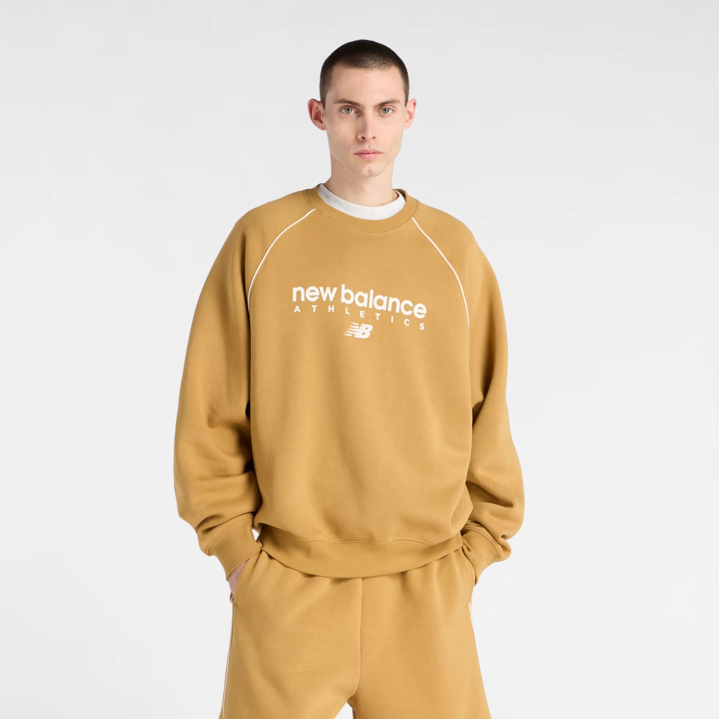 New balance Свитшот 'Trackside' в цвете Saffron
New balance Свитшот 'Trackside' в цвете Saffron