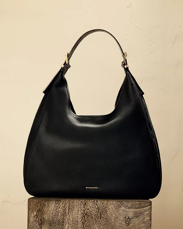 Большая кожаная сумка-хобо Nolita через плечо Michael Kors, черный
Большая кожаная сумка-хобо Nolita через плечо Michael Kors, черный