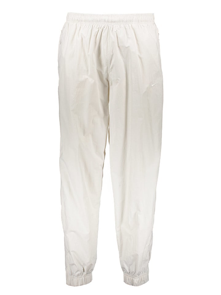 Спортивные брюки кремового цвета Nike
Спортивные брюки кремового цвета Nike