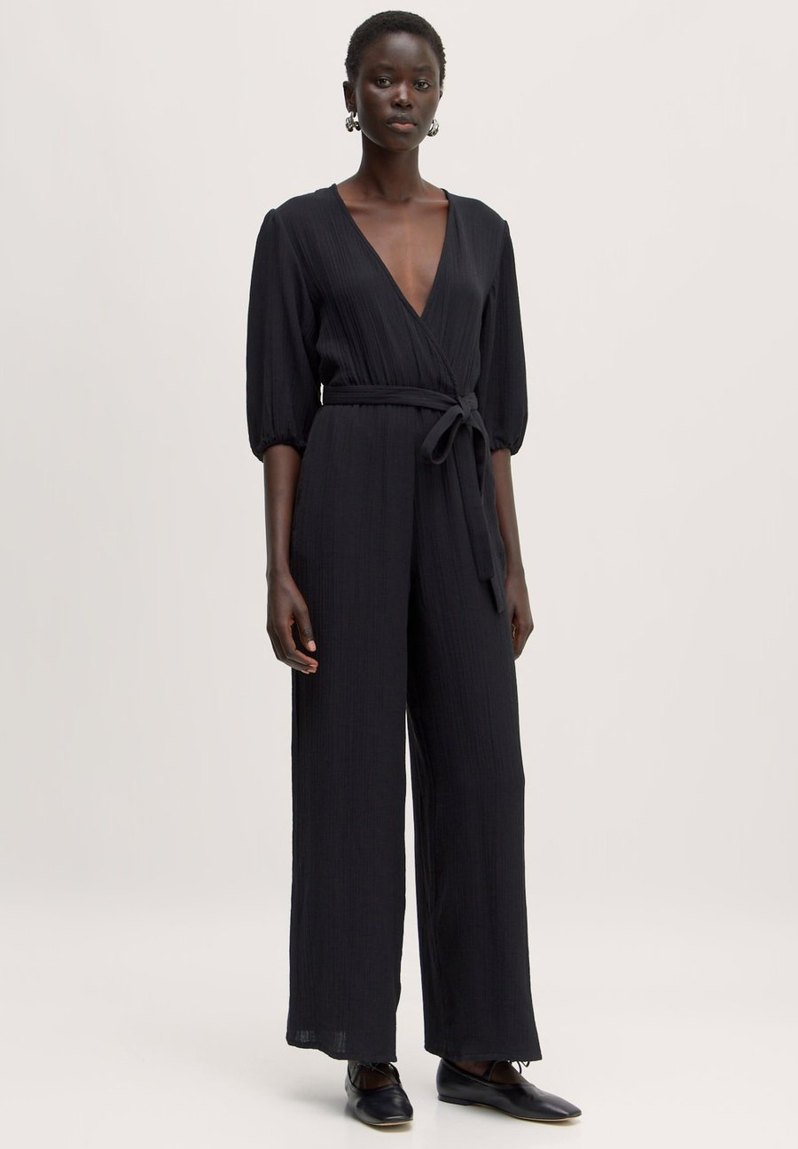 Комбинезон EDITED DAVIDE, Schwarz/Black
Комбинезон EDITED DAVIDE, Schwarz/Black