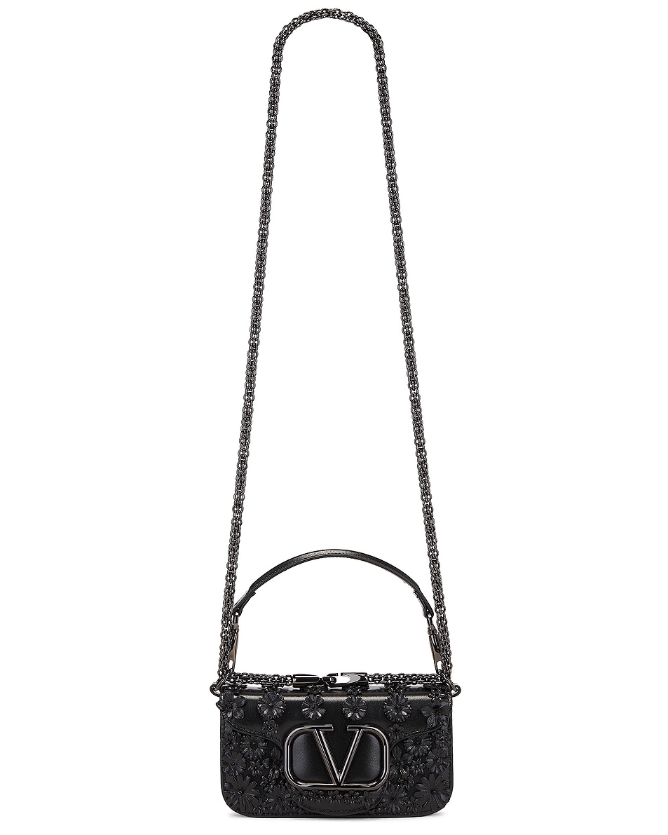 Маленькая сумка через плечо Loco Valentino Garavani, цвет Nero
Маленькая сумка через плечо Loco Valentino Garavani, цвет Nero