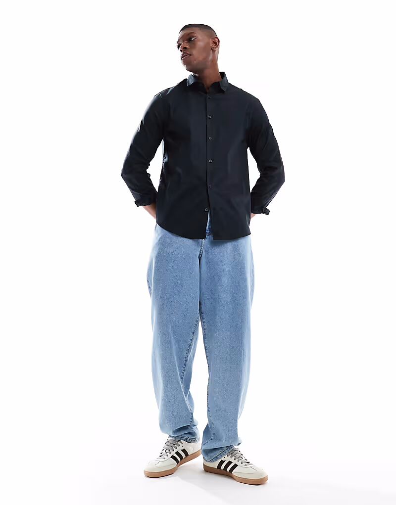 ASOS DESIGN формальная рубашка из легкого в уходе твила черного цвета
ASOS DESIGN формальная рубашка из легкого в уходе твила черного цвета