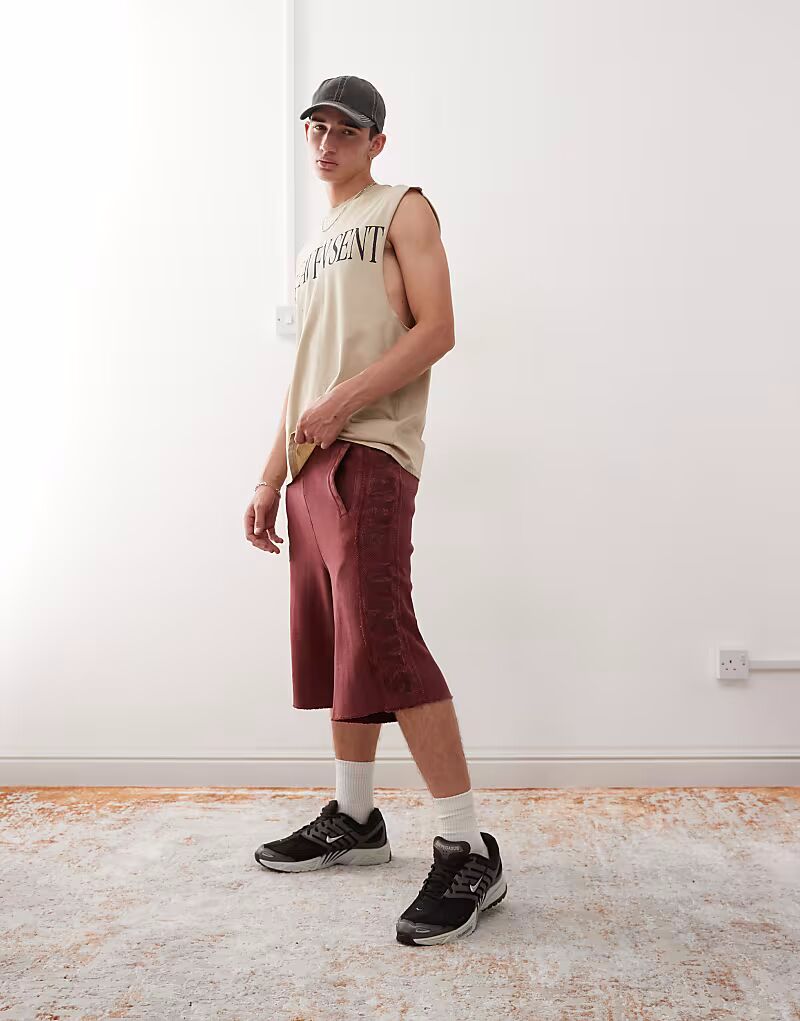 Aape by A Bathing Ape свободные шорты из плотной трикотажной ткани темно-бордового цвета с вышитой полосой сбоку AAPE BY A BATHING APE 
Aape by A Bathing Ape свободные шорты из плотной трикотажной ткани темно-бордового цвета с вышитой полосой сбоку AAPE BY A BATHING APE