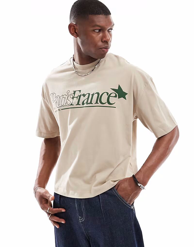 Футболка свободного кроя ASOS DESIGN бежевого цвета с принтом города спереди
Футболка свободного кроя ASOS DESIGN бежевого цвета с принтом города спереди