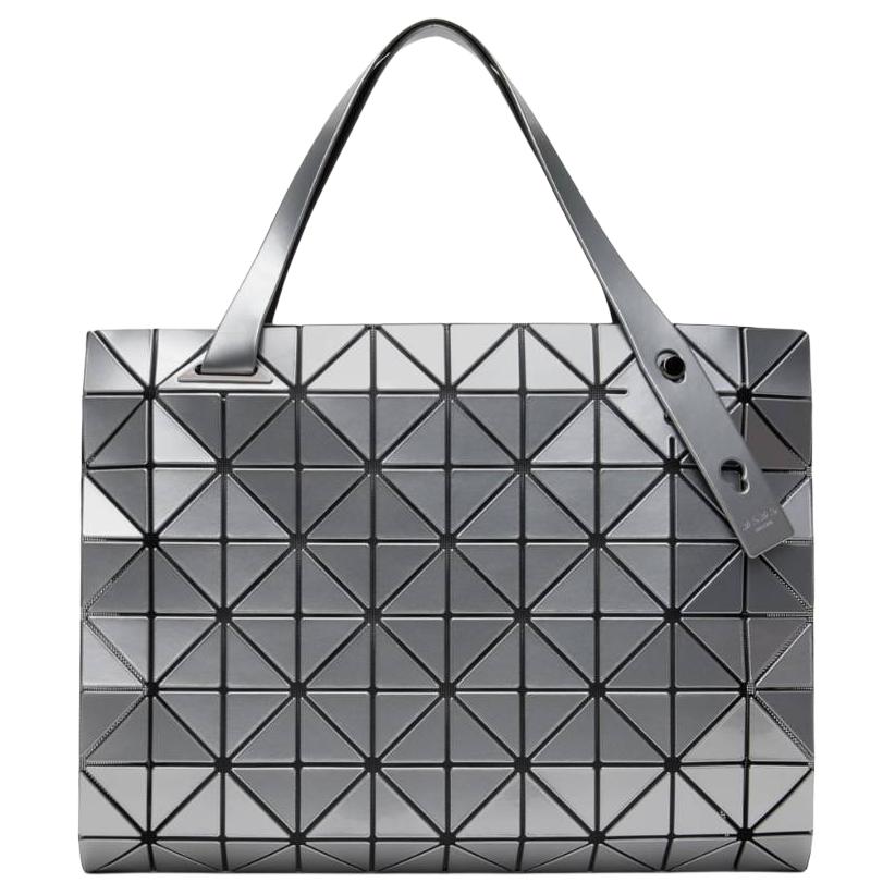 ISSEY MIYAKE Сумка-шоппер из ПВХ, шоппинг-сумка, женская сумка через плечо Silver
ISSEY MIYAKE Сумка-шоппер из ПВХ, шоппинг-сумка, женская сумка через плечо Silver