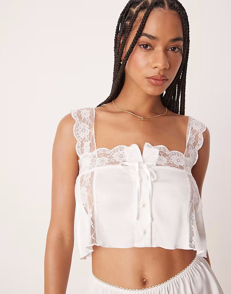 Топ Kat The Label Cindy цвета слоновой кости с отделкой из атласа и кружева
Топ Kat The Label Cindy цвета слоновой кости с отделкой из атласа и кружева