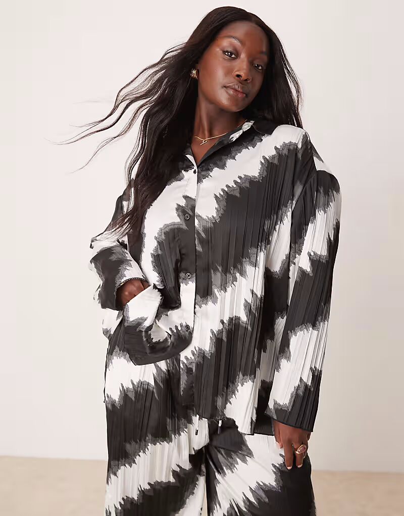 Рубашка свободного кроя ASOS DESIGN Curve с плиссировкой и монохромным принтом
Рубашка свободного кроя ASOS DESIGN Curve с плиссировкой и монохромным принтом
