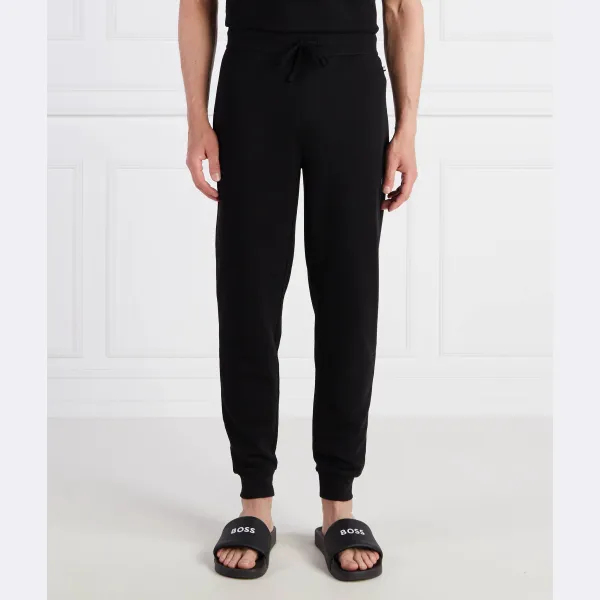 Пижамные брюки стандартного кроя вафельного цвета. Boss, черный
Пижамные брюки стандартного кроя вафельного цвета. Boss, черный