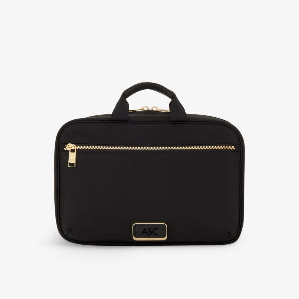 Нейлоновая косметичка Madeline на молнии с передним карманом Tumi, черный
Нейлоновая косметичка Madeline на молнии с передним карманом Tumi, черный