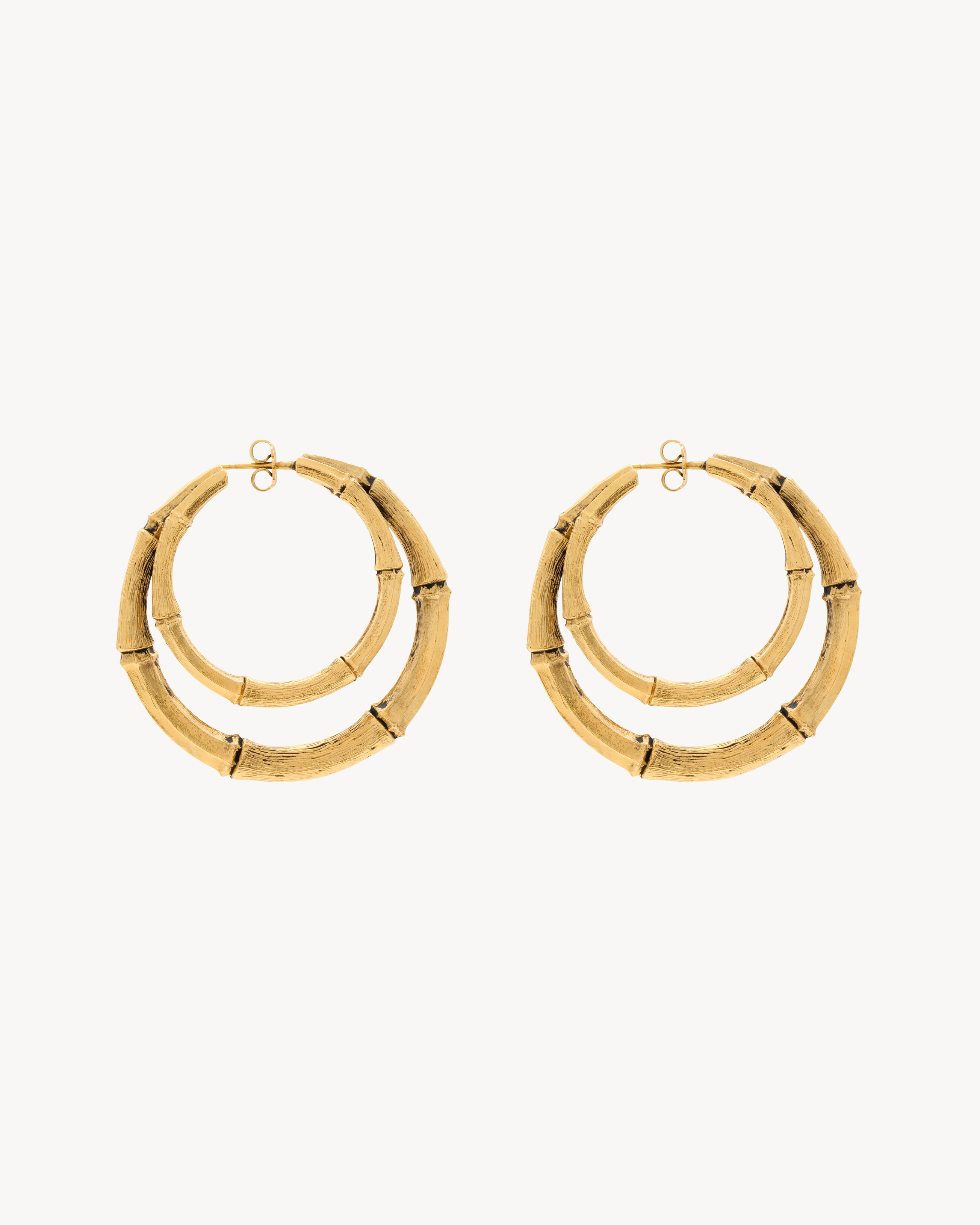 Серьги-кольца из металла с двойным бамбуковым дизайном Saint Laurent, золото
Серьги-кольца из металла с двойным бамбуковым дизайном Saint Laurent, золото