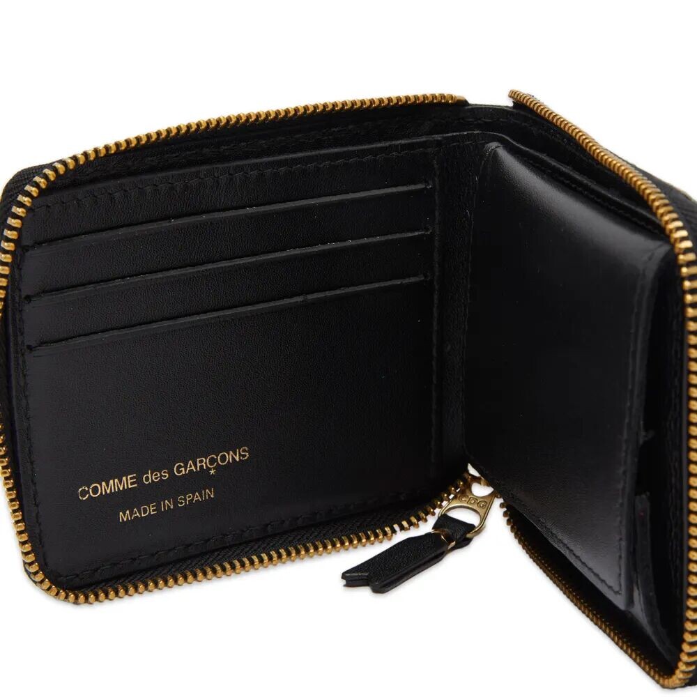 Comme des Garçons Чечевицеобразный кошелек в клетку тартан, зеленый
Comme des Garçons Чечевицеобразный кошелек в клетку тартан, зеленый