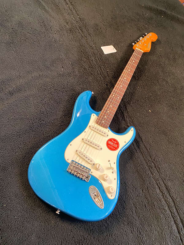 Squier Classic Vibe 60s Stratocaster, синий Лейк-Плэсид #ISSI21002304 (7 фунтов 10,1 унции) Classic Vibe 60s Stratocaster, Lake Placid Blue
Squier Classic Vibe 60s Stratocaster, синий Лейк-Плэсид #ISSI21002304 (7 фунтов 10,1 унции) Classic Vibe 60s Stratocaster, Lake Placid Blue