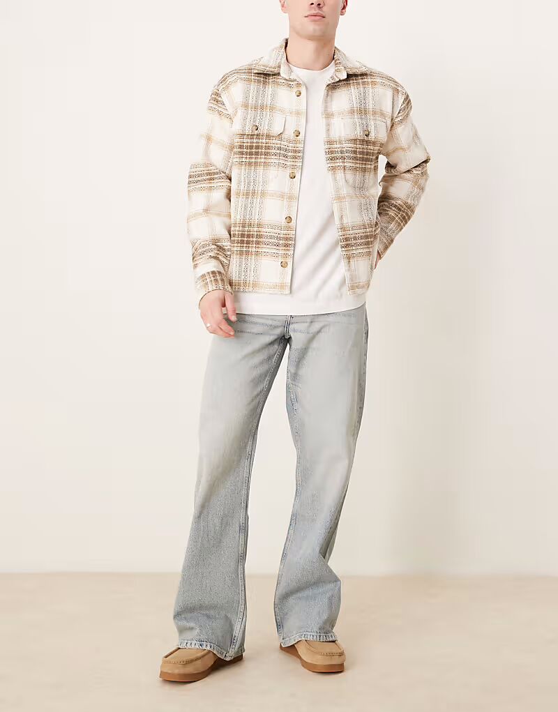 Широкие джинсы-клеш ASOS DESIGN из выбеленного материала
Широкие джинсы-клеш ASOS DESIGN из выбеленного материала