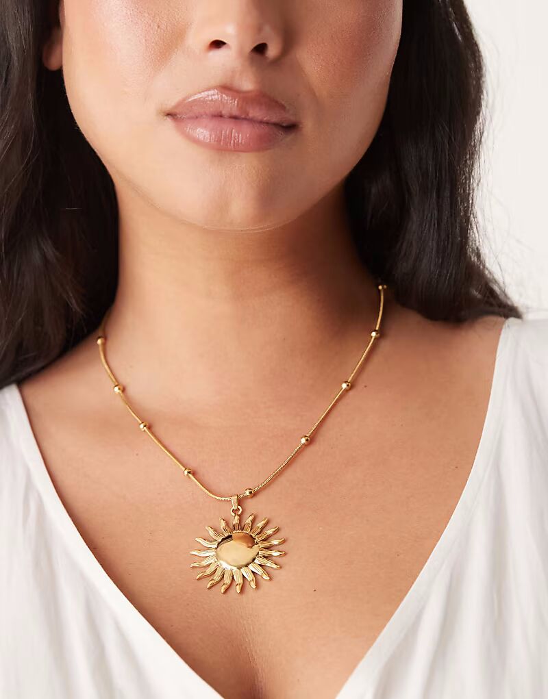 Ожерелье Curve из нержавеющей стали с подвеской-солнцем золотистого оттенка Asos Curve
Ожерелье Curve из нержавеющей стали с подвеской-солнцем золотистого оттенка Asos Curve