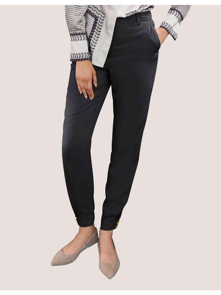 MADELEINE Узкие брюки с модными подворотами черного цвета
MADELEINE Узкие брюки с модными подворотами черного цвета