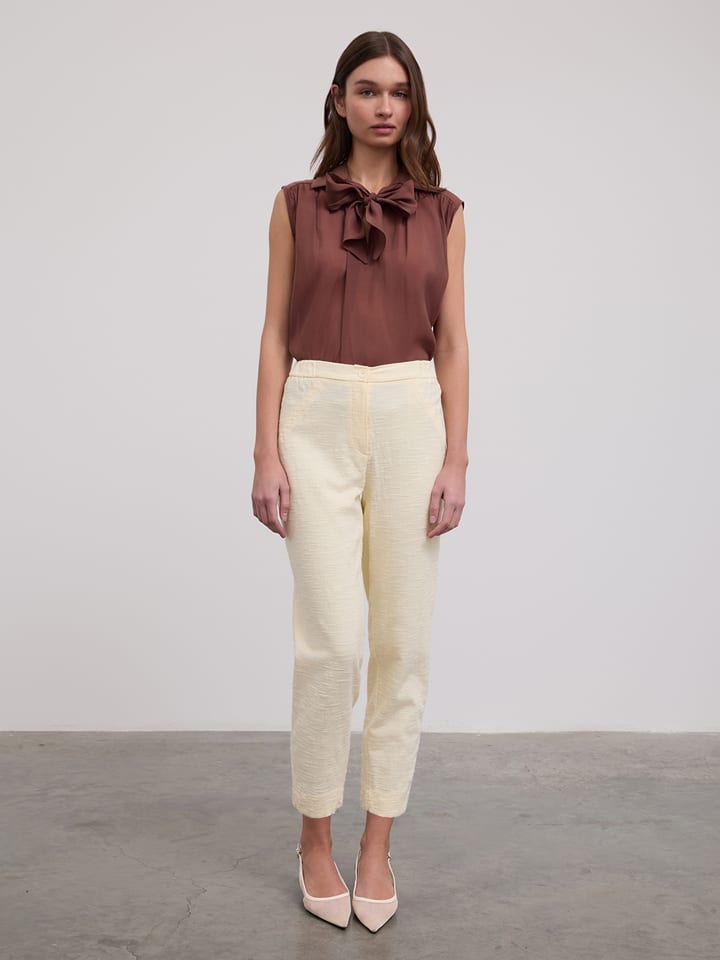 Брюки кремового цвета BGN
Брюки кремового цвета BGN