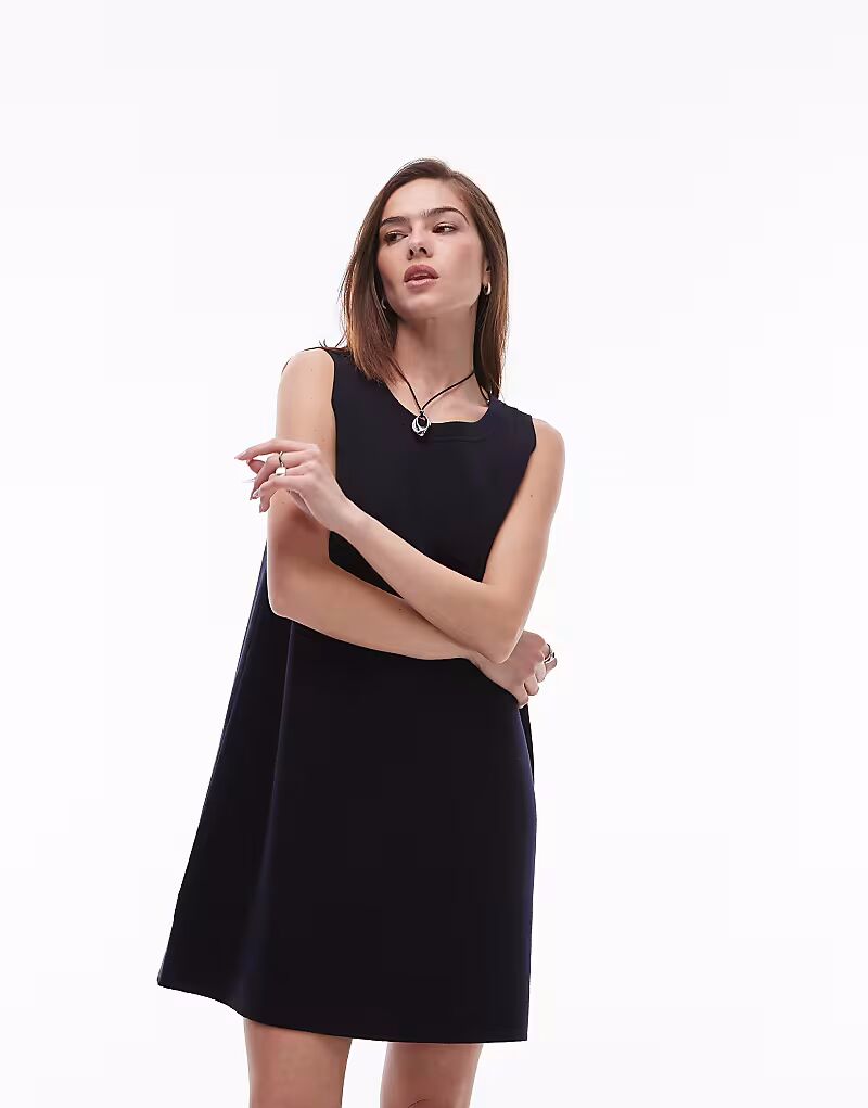 ARKET ажурное мини-платье темно-синего цвета
ARKET ажурное мини-платье темно-синего цвета