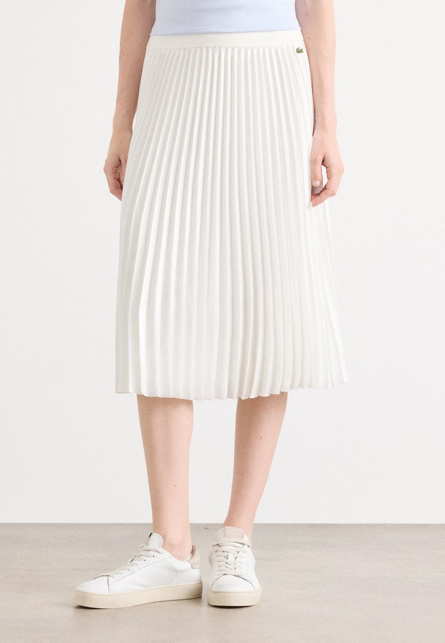 Юбка Lacoste Pleated skirt, Flour/Off-White
Юбка Lacoste Pleated skirt, Flour/Off-White