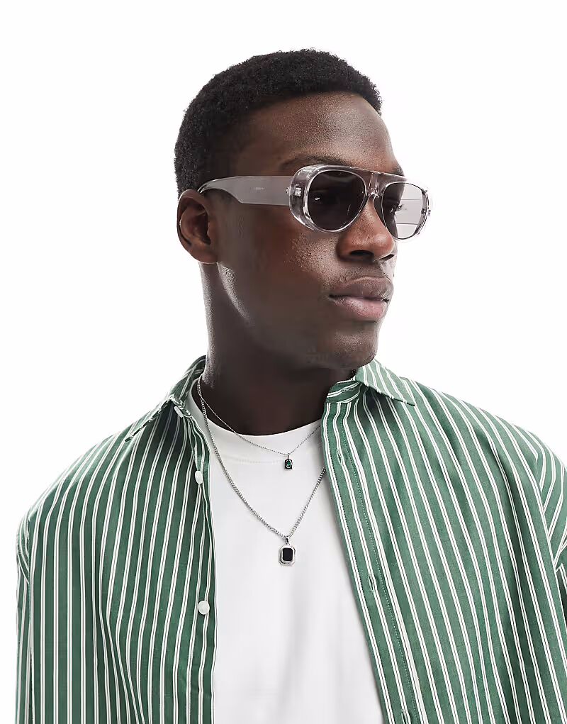 Солнцезащитные очки-авиаторы ASOS DESIGN Festival с серыми линзами и оправой из прозрачных кристаллов
Солнцезащитные очки-авиаторы ASOS DESIGN Festival с серыми линзами и оправой из прозрачных кристаллов