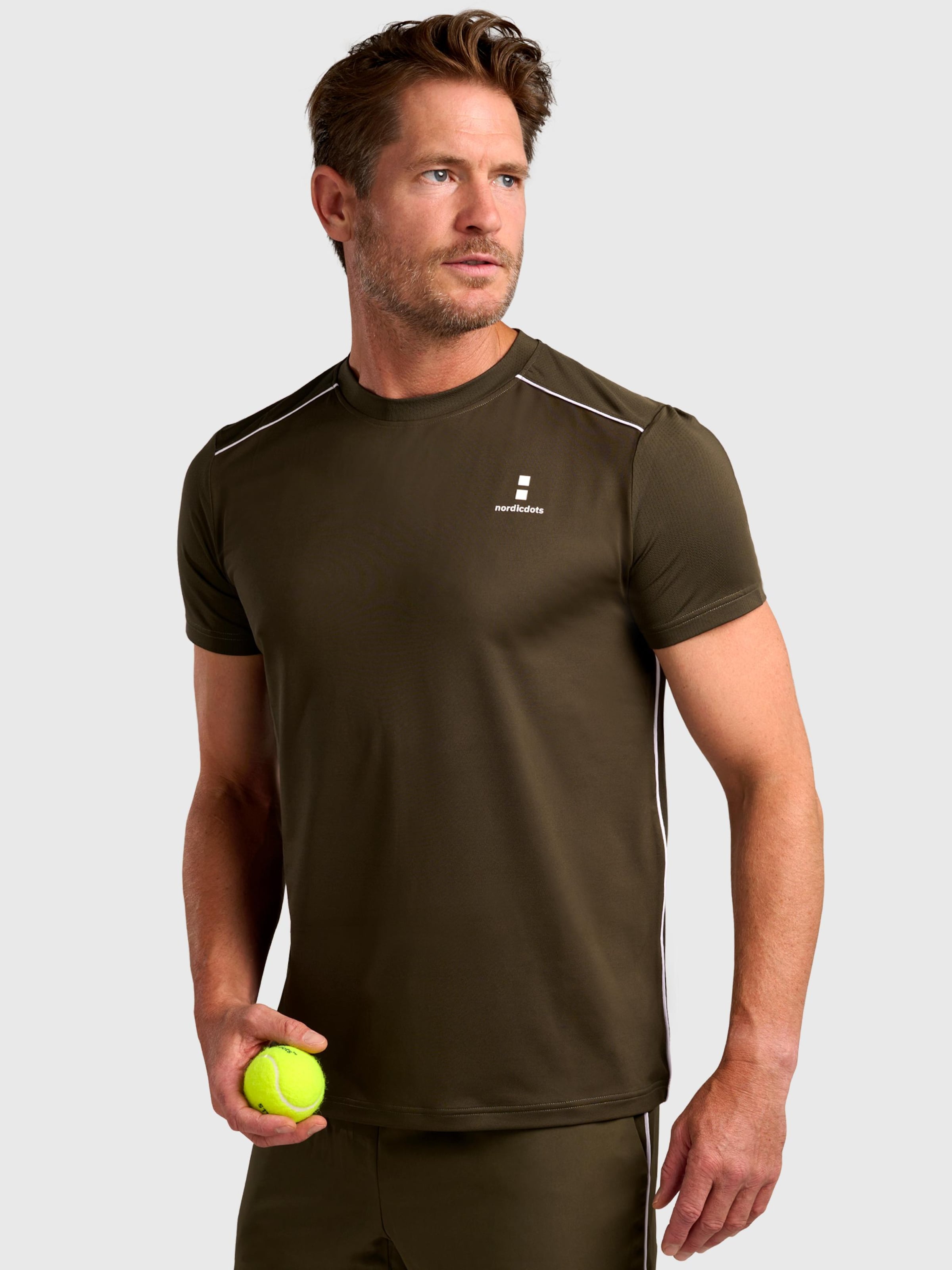 Nordicdots Футболка Performance в цвете Olive
Nordicdots Футболка Performance в цвете Olive