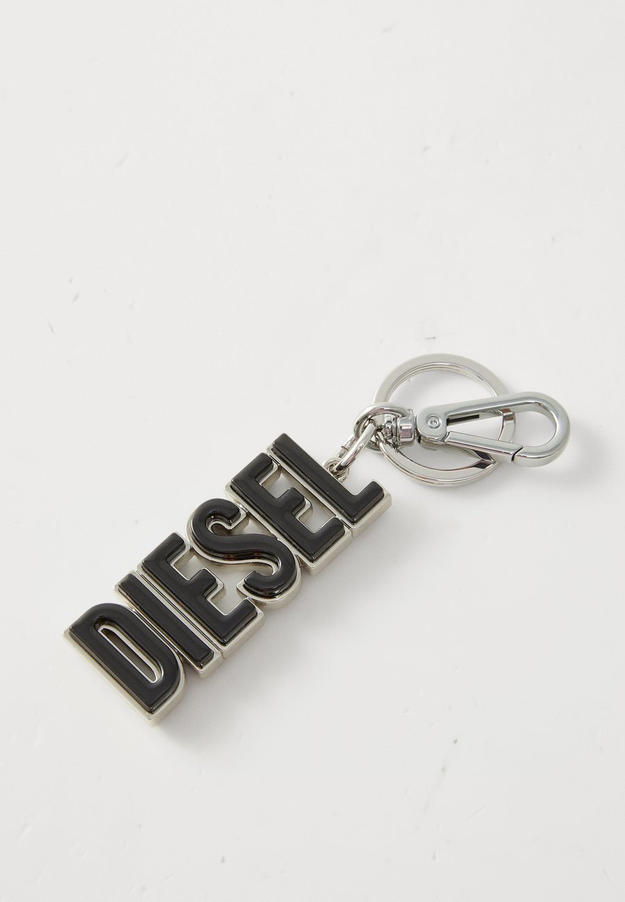 Кошелек Diesel 3D KEY RING UNISEX, Ha898/Black
Кошелек Diesel 3D KEY RING UNISEX, Ha898/Black