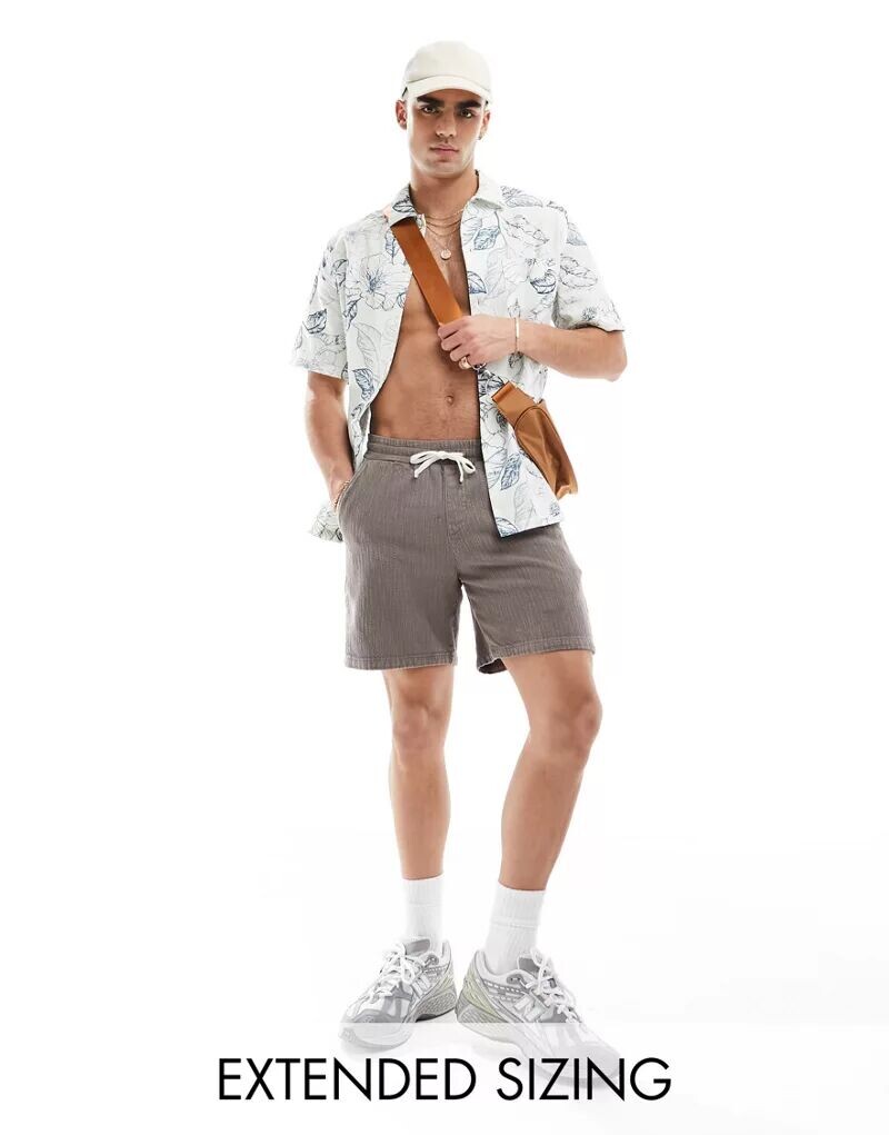 Свободная рубашка ASOS с винтажным тропическим цветочным принтом
Свободная рубашка ASOS с винтажным тропическим цветочным принтом