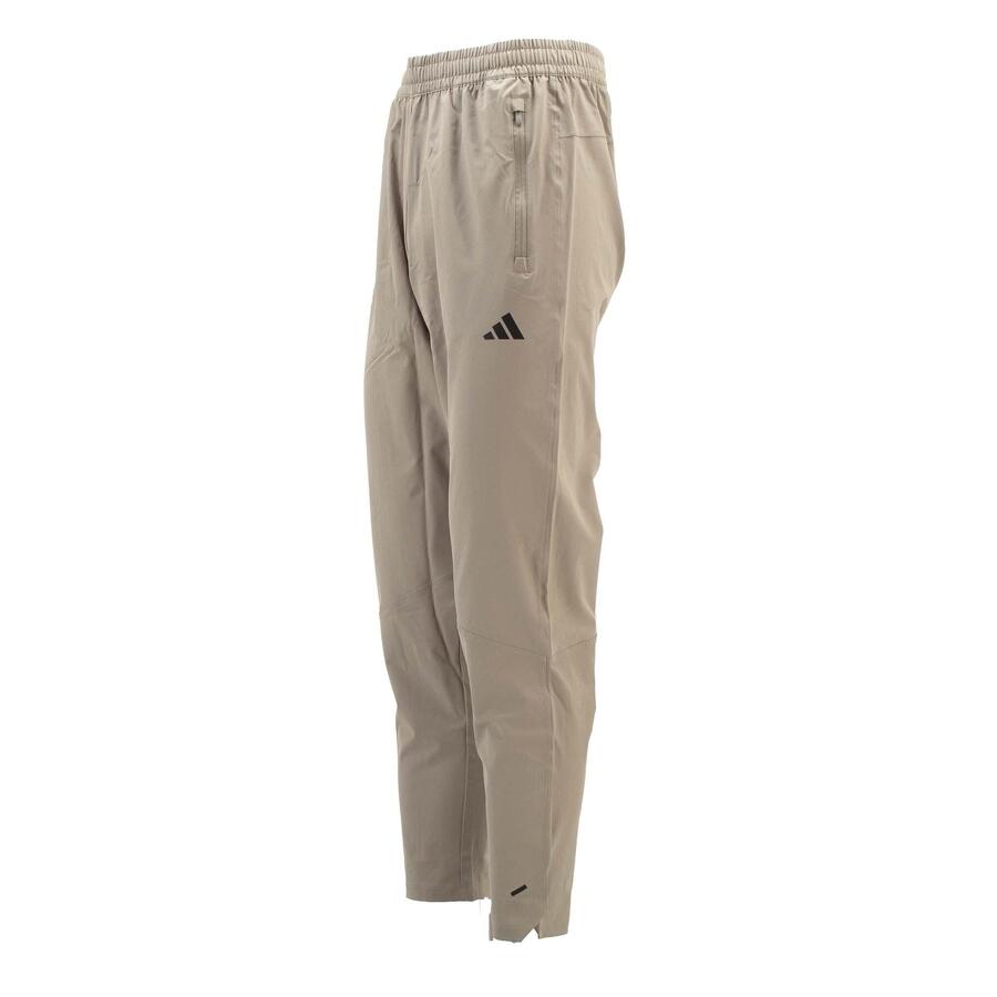 ADIDAS Тренировочные брюки Training Woven Pant бежевого цвета
ADIDAS Тренировочные брюки Training Woven Pant бежевого цвета