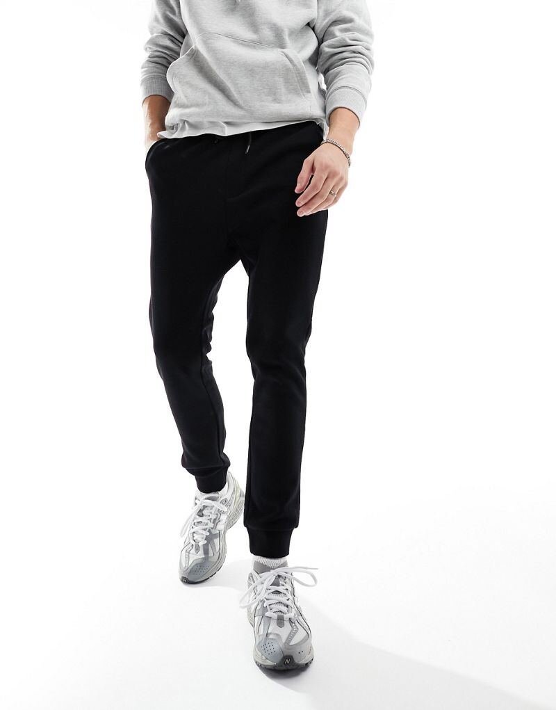 Jack & Jones – узкие джоггеры черного цвета
Jack & Jones – узкие джоггеры черного цвета