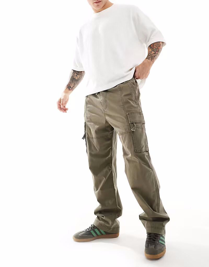 Hollister - свободные брюки-карго серого цвета с эластичным поясом
Hollister - свободные брюки-карго серого цвета с эластичным поясом