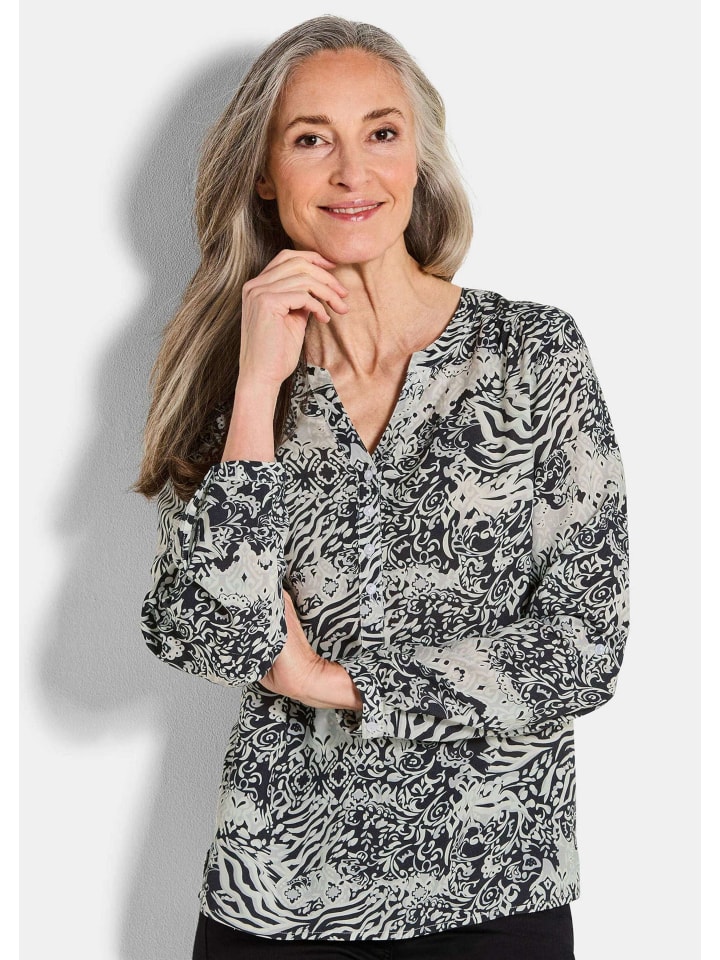 Блузка-рубашка с цветочным принтом и V-образным вырезом черного цвета / с рисунком GOLDNER
Блузка-рубашка с цветочным принтом и V-образным вырезом черного цвета / с рисунком GOLDNER