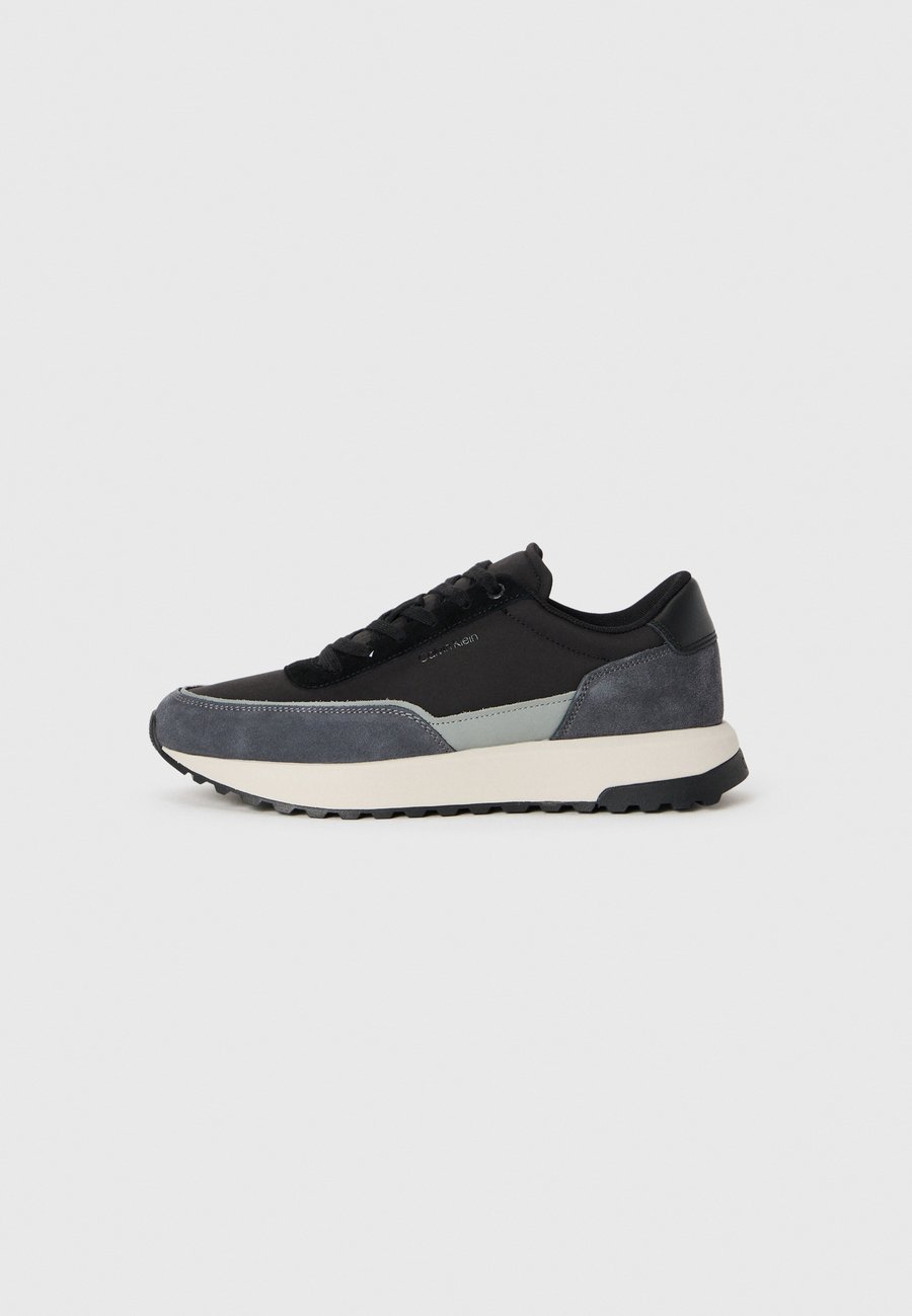 Кроссовки Calvin Klein Trainers, Magnet/Black/Granite Road/Black
Кроссовки Calvin Klein Trainers, Magnet/Black/Granite Road/Black