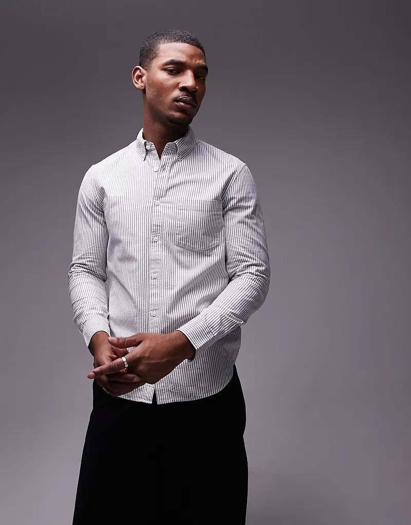 Рубашка ARKET оксфорд серого цвета в тонкую полоску
Рубашка ARKET оксфорд серого цвета в тонкую полоску