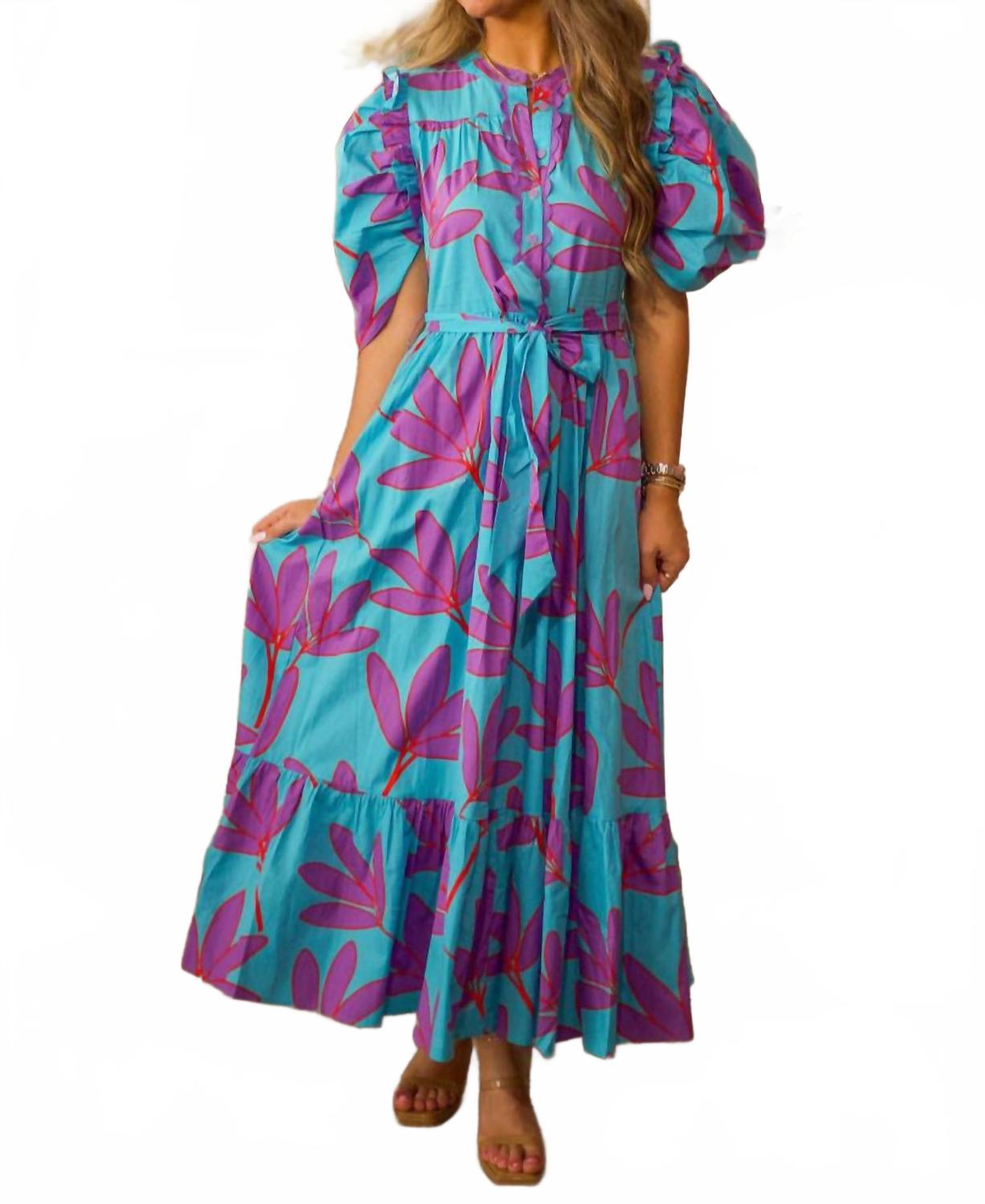 Бирюзовое макси-платье с пальмовым листом и завязками на пуговицах Karlie
Бирюзовое макси-платье с пальмовым листом и завязками на пуговицах Karlie