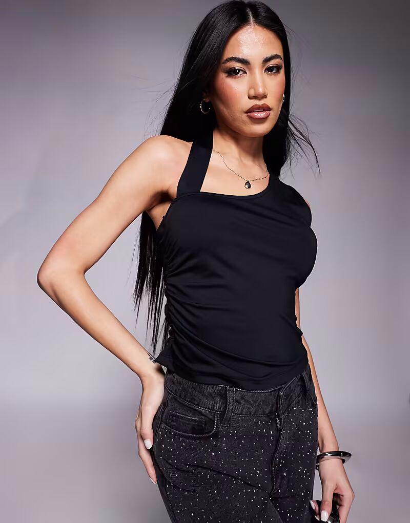 Майка ASOS DESIGN со сборками по бокам и ремешком, черного цвета
Майка ASOS DESIGN со сборками по бокам и ремешком, черного цвета