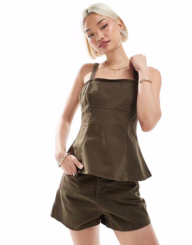 Джинсовый топ с баской и ремешками ASOS DESIGN коричневого цвета
Джинсовый топ с баской и ремешками ASOS DESIGN коричневого цвета