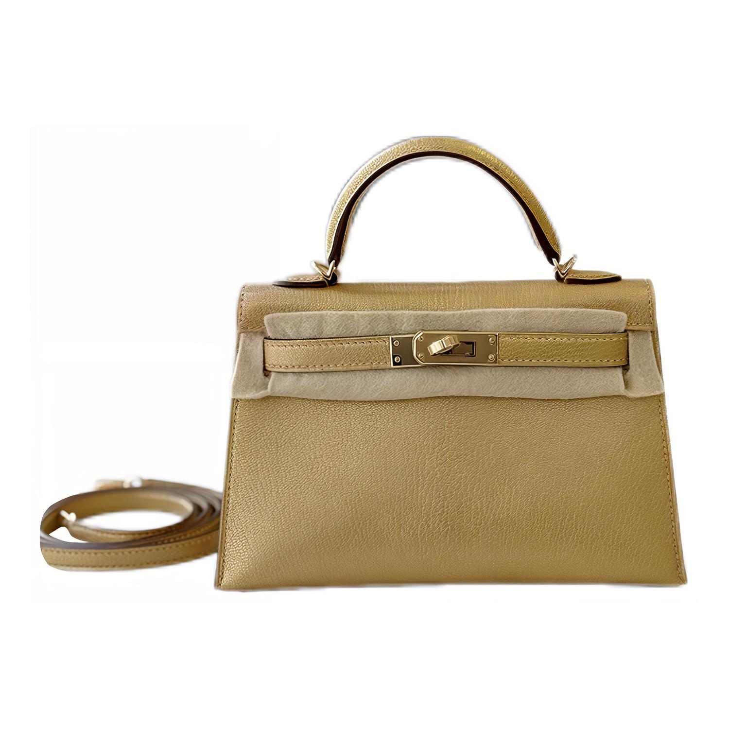 Мини Келли второго поколения из кожи шамуа Келли Сумка через плечо кроссбод сумка женская Y9 доре золото HERMES
Мини Келли второго поколения из кожи шамуа Келли Сумка через плечо кроссбод сумка женская Y9 доре золото HERMES