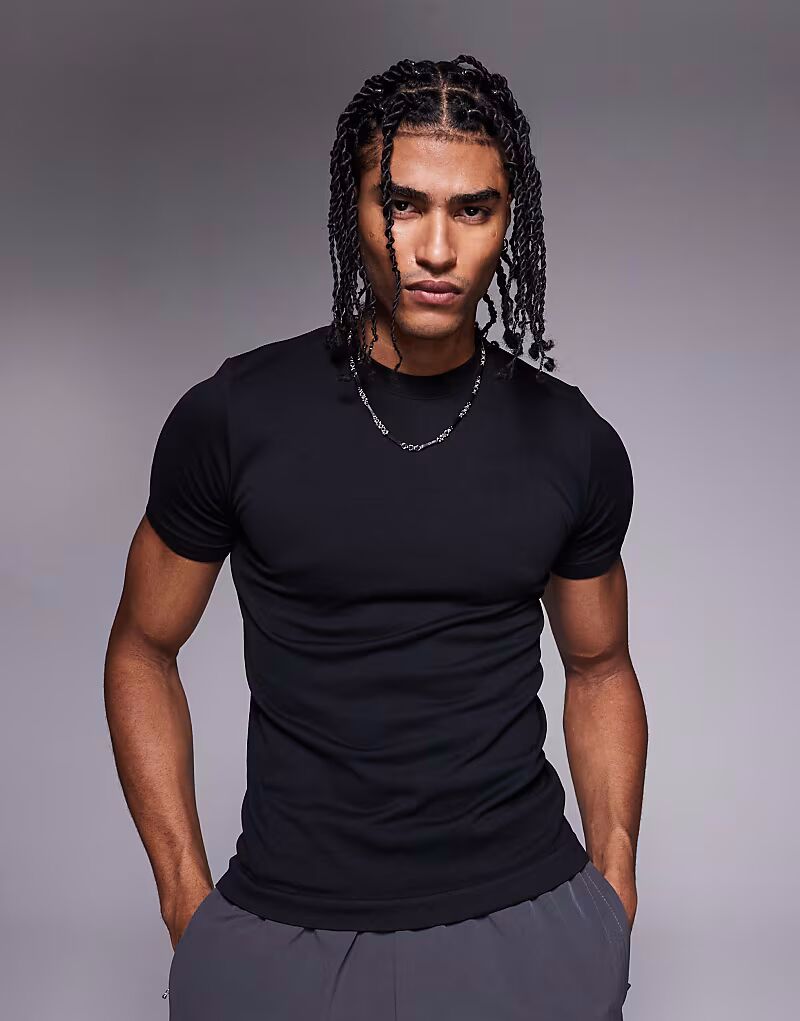 Облегающая бесшовная тренировочная футболка в рубчик черного цвета 4505
Облегающая бесшовная тренировочная футболка в рубчик черного цвета 4505