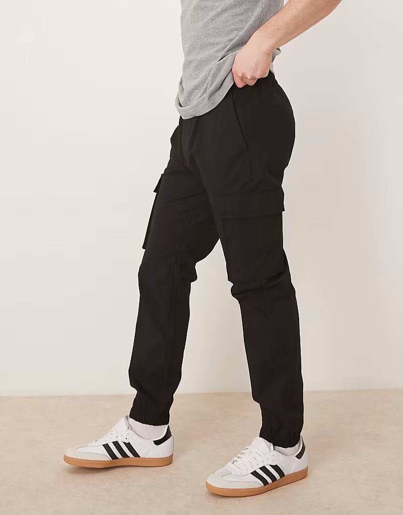 Эластичные узкие брюки Calvin Klein Jeans из рипстопа черного цвета
Эластичные узкие брюки Calvin Klein Jeans из рипстопа черного цвета