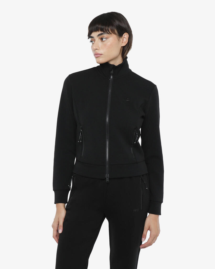 JAKED черная женская толстовка из синтетического материала для фитнеса
JAKED черная женская толстовка из синтетического материала для фитнеса