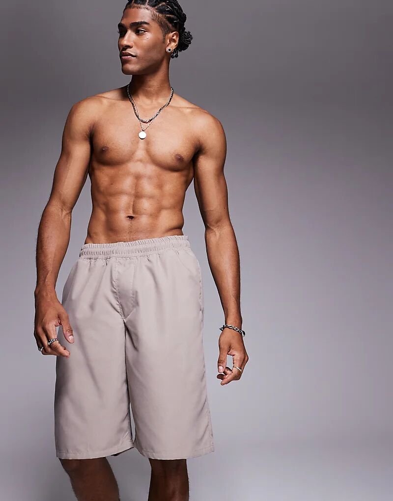 Длинные шорты для плавания ASOS DESIGN бежевого цвета
Длинные шорты для плавания ASOS DESIGN бежевого цвета