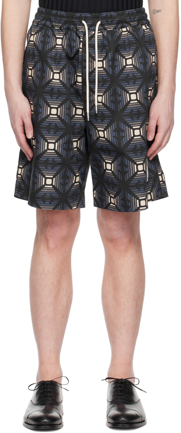 Синие шорты с принтом Emporio Armani
Синие шорты с принтом Emporio Armani