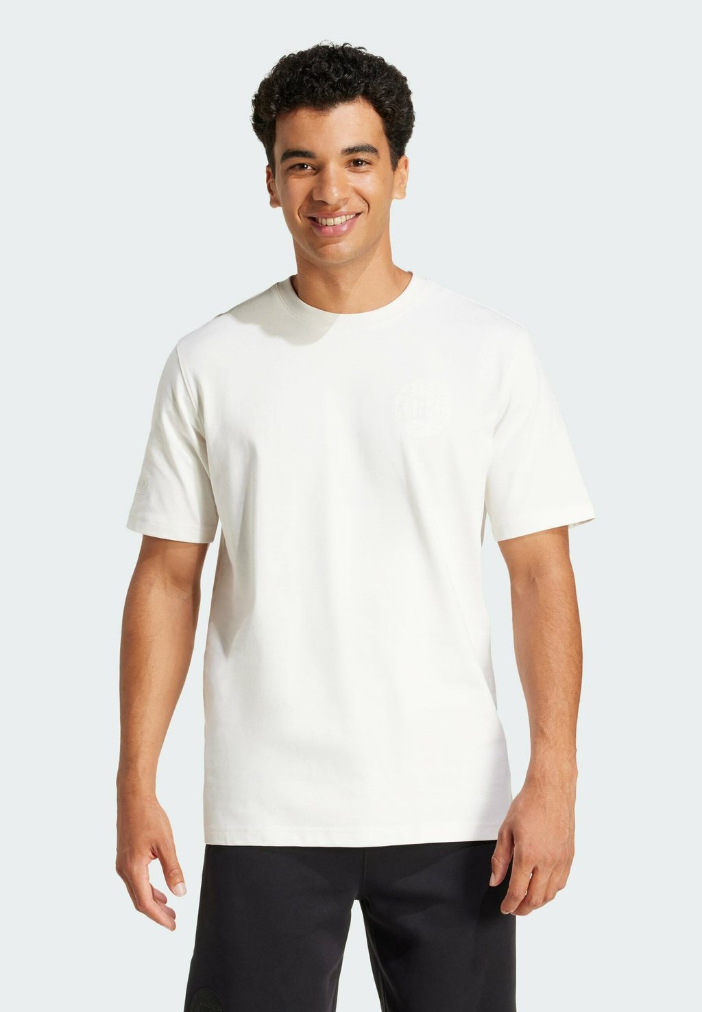 Базовая футболка GERMANY ANNIVERSARY - National team wear Adidas Originals, белый 
Базовая футболка GERMANY ANNIVERSARY - National team wear Adidas Originals, белый