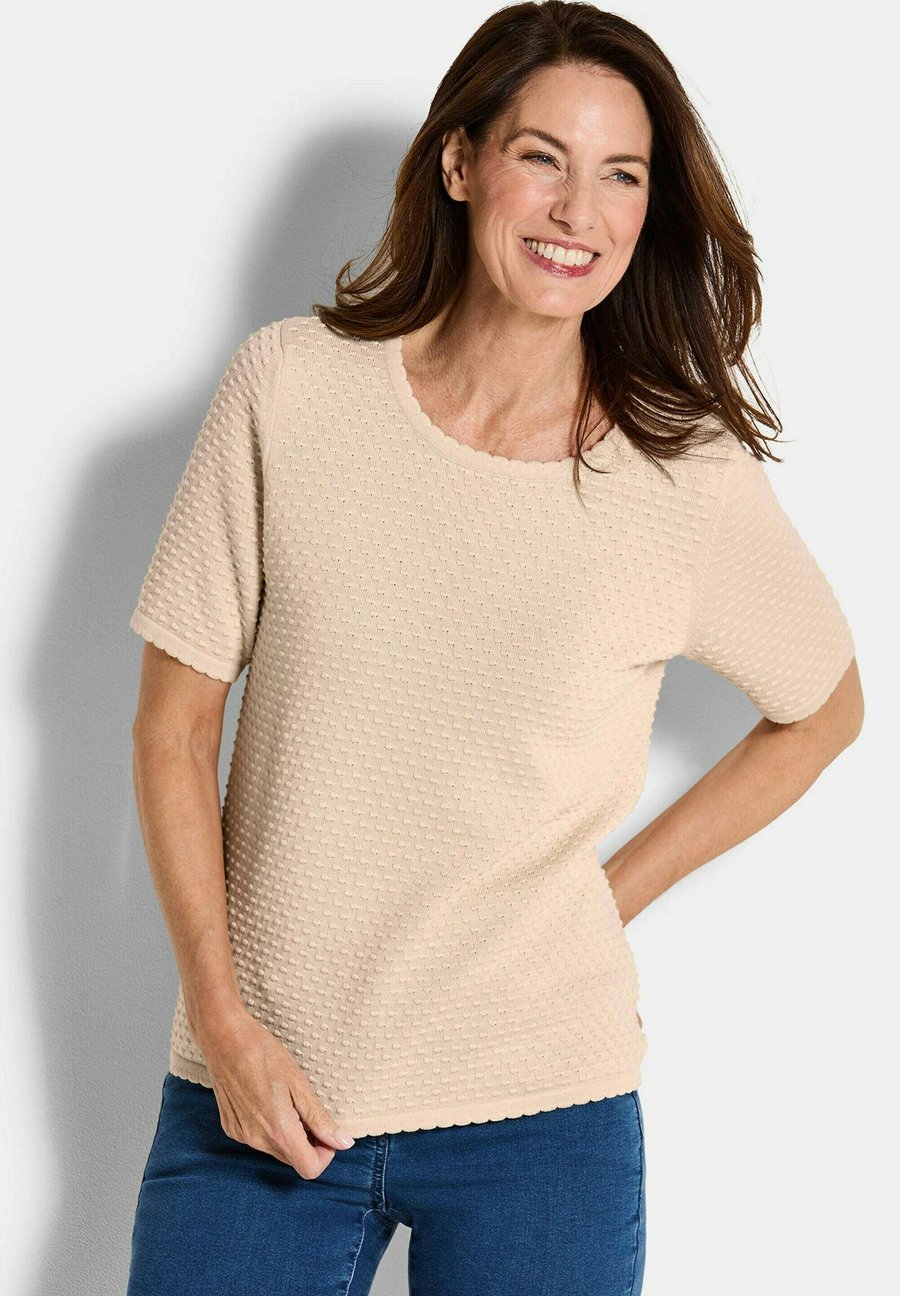 Футболка GOLDNER HALBARM MIT PÜNKTCHENMUSTER, Beige
Футболка GOLDNER HALBARM MIT PÜNKTCHENMUSTER, Beige