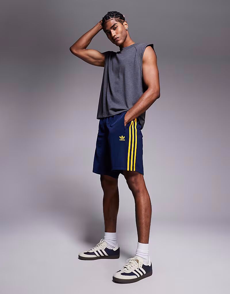 Шорты Adidas Originals Firebird темно-синего цвета
Шорты Adidas Originals Firebird темно-синего цвета