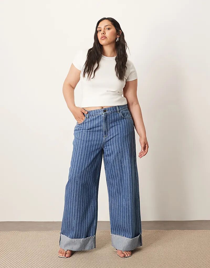 Джинсы ARRANGE Curve Parker с высокой талией, свободными подворотами и лазерной полоской
Джинсы ARRANGE Curve Parker с высокой талией, свободными подворотами и лазерной полоской